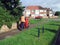 Postman pushing a cart or a delivery post trolley