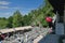 Postojna, Slovenia - Jun 26, 2011: Square with tourists in front of entrance to cave `Postojnska jama`