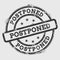 Postponed rubber stamp isolated on white.