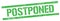 POSTPONED text on green grungy rectangle stamp