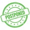 POSTPONED text on green grungy round rubber stamp