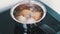 Pot of Boiling Water on a Induction Stove in Which Chicken Eggs are Cooked