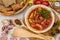 Pot goulash with divas placed on the table of ingredients