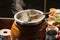 .The pot is prepared for cooking. The noodles are in low-light, boiling water with white smoke and steam on black background