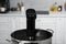 Pot with sous vide cooker in kitchen, closeup. Thermal immersion circulator