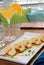 Pot stickers with an orange martini