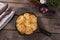 Potato casserole with cheese in a frying pan serving vegetarian dish homemade