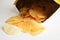 Potato chips in open bag, delicious BBQ seasoning spicy for crips, thin slice deep fried snack fast food