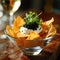 Potato chips with sour cream and black caviar.