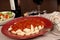 Potato gnocchi with marinara sauce with a salad and wine