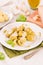 Potato gnocchi stuffed with pesto sauce.