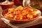 Potato gnocchi with tomato sauce on a wooden table. Generative AI