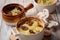 Potato gratin with mushrooms in baking cocottes