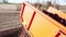 Potato harvester unloads potatoes in a Truck for transport. Farm machinery Harvesting fresh organic potatoes in an