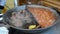 Potato meat vegetable stew bake huge pan outdoor restaurant