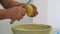 potato peeling close-up. a cook peels potatoes over a garbage can