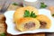 Potato zrazy with a meat filling on a white plate and a vintage wooden table. Traditional Ukrainian zrazy recipe. Closeup