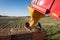 Potatoes being unloaded into wooden bins and levelled out on a farm in New Zealand