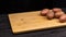 Potatoes on a cutting board prepared for cleaning and slicing. Ingredient for fried or boiled dishes