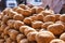 Potatoes lined on a counter of open market