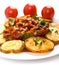 Potatoes with meat tomato sauce