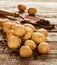 Potatoes, spade and soil on vintage wood table