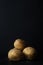 Potatoes Still Life on Black Slate with Soil Dusting