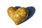 Potatoes washed in the shape of a heart with a shadow on a white background