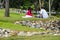 Potrait of happy young couple enjoying a day in park together