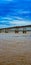 Potrait image of flooded Godavari River flows under rail cum road bridge , Rajahmundry, Andhrapradesh