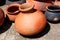 Pots, dishes, and other articles made of baked clay.