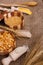 Pots, stingray and spoon with cereals on a napkin napkin close-up