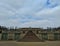 Potsdam / Germany - March 24 2018: Cascade of vineyards in the park Sans Souci. Palace Sans Souci in the distance