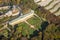 Potsdam, New Chambers of Sanssouci and Historic Windmill during early autumn - aerial view