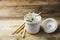 Potted blue stilton cheese on a spoon and in a ceramic jar, some