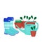 Potted plants, watering can and rubber boots.