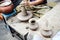 Potter man hands shaping ceramic craft