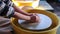 Potter`s wheel in the pottery workshop. Handcraft Pottery inside. kids Hands working on pottery wheel, shaping a clay