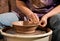 Potter Shaping Clay