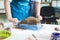 Pottering Concept. Closeup of Hands of Professional Female Ceramist During a Process of Clay Preparation With Wire on Table in