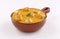 Pottery bowl chicken curry tandoori shish with sauce on white background