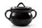 Pottery cookware and traditional rustic kitchenware concept with single black terracotta pot with handles and lid isolated on