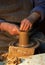 Pottery. Hands of a potter who makes a jug of clay.Craft