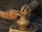 Pottery. Hands of a potter who makes a jug of clay.Craft