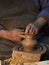 Pottery. Hands of a potter who makes a jug of clay.Craft