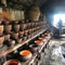 a pottery kiln, making a decorative set of plates for food on an open fire. Eco-friendly ceramic dishes