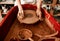 Pottery is a messy business. an unrecognizable woman molding clay on a pottery wheel.