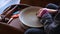 Pottery polishing process with 2 hands in the final step.