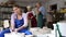 In pottery workshop, girl works with raw clay