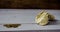 Pouch of gold coins on wooden background